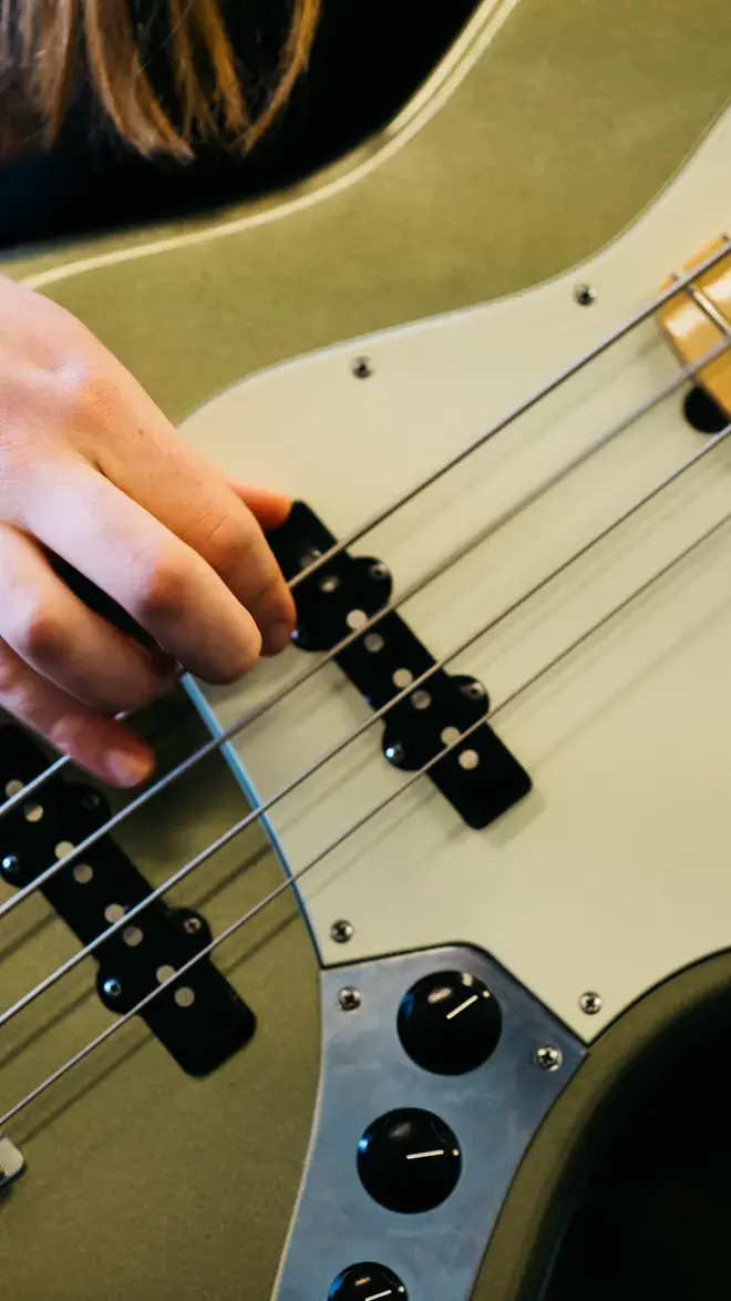 docent muziek -gitaar